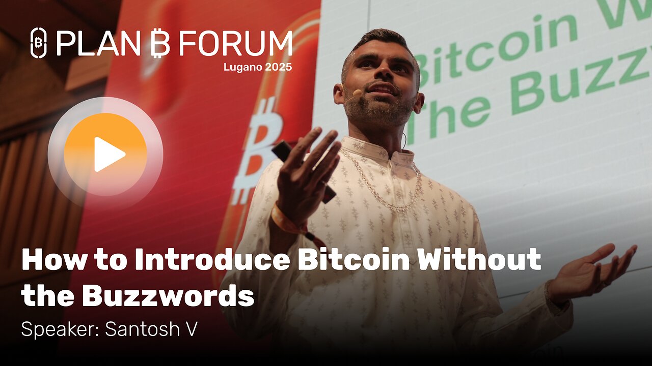 Santosh on stage at Plan B Forum Lugano, presenting the talk How to Introduce Bitcoin Without the Buzzwords